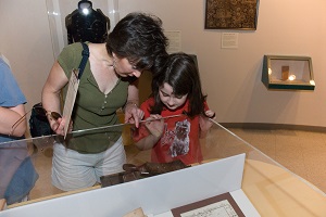 Mother and daughter looking at exhibits in the visitor center