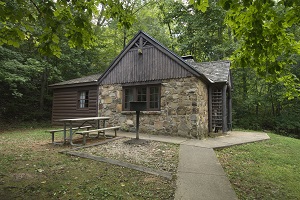 exterior of rustic stone cabin
