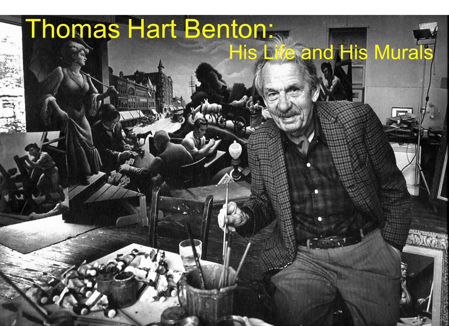 Benton with some of his art