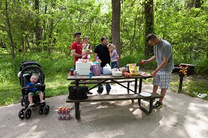 a family enjoying a picnic at one of the picnic sites