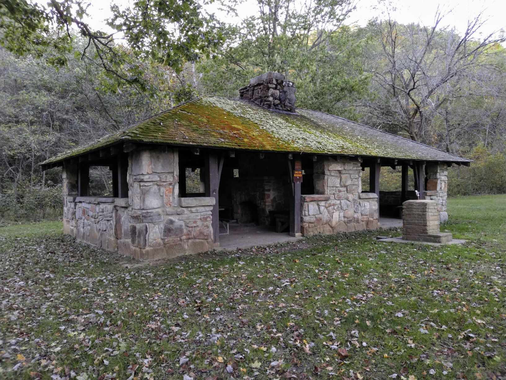 Exterior of stone CCC shelter and water fountain