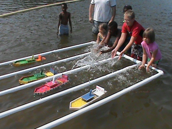 kids racing toy, non-motorized boats in the lake