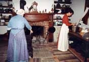 two woman working in the kitchen