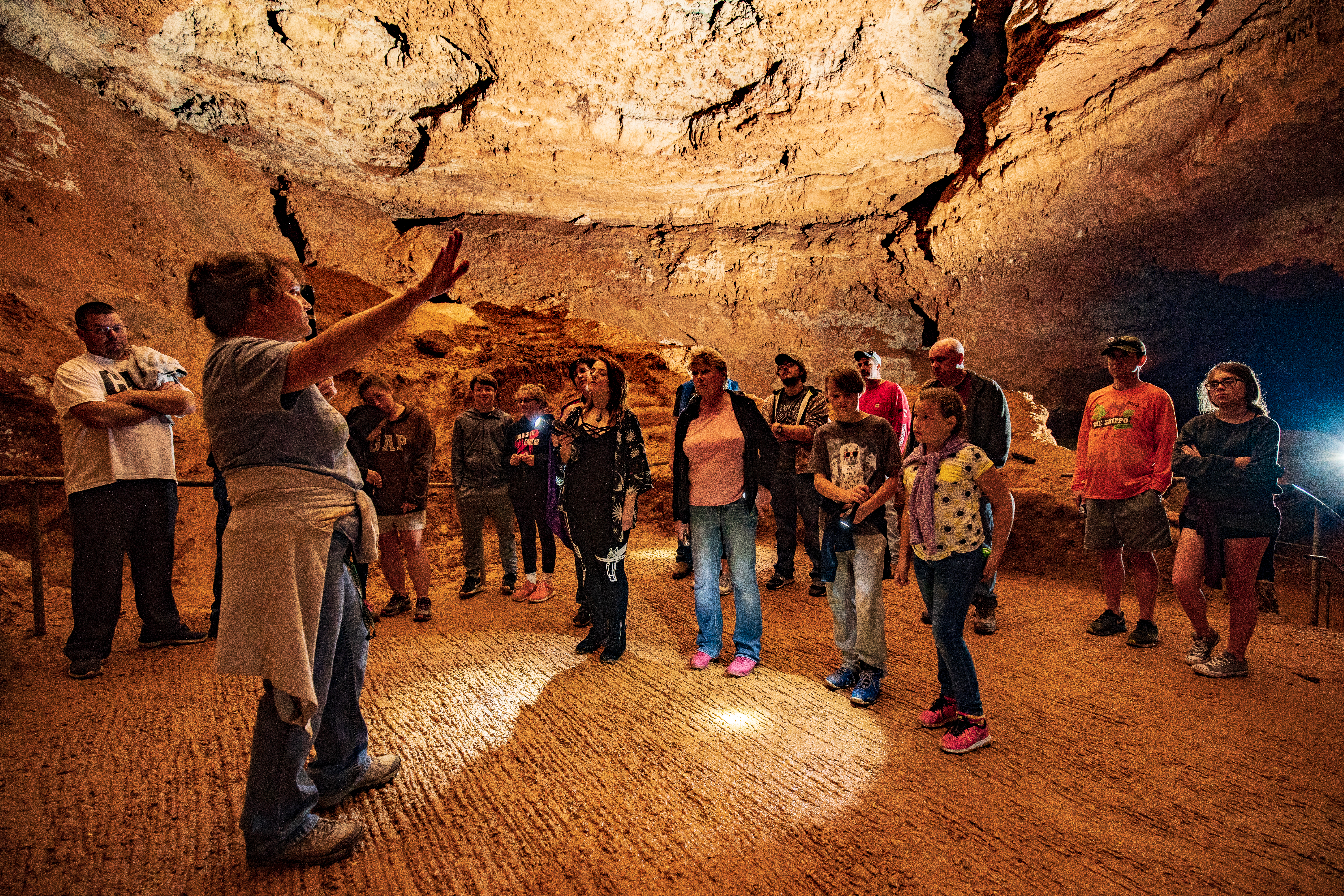 A group gathered in a cave