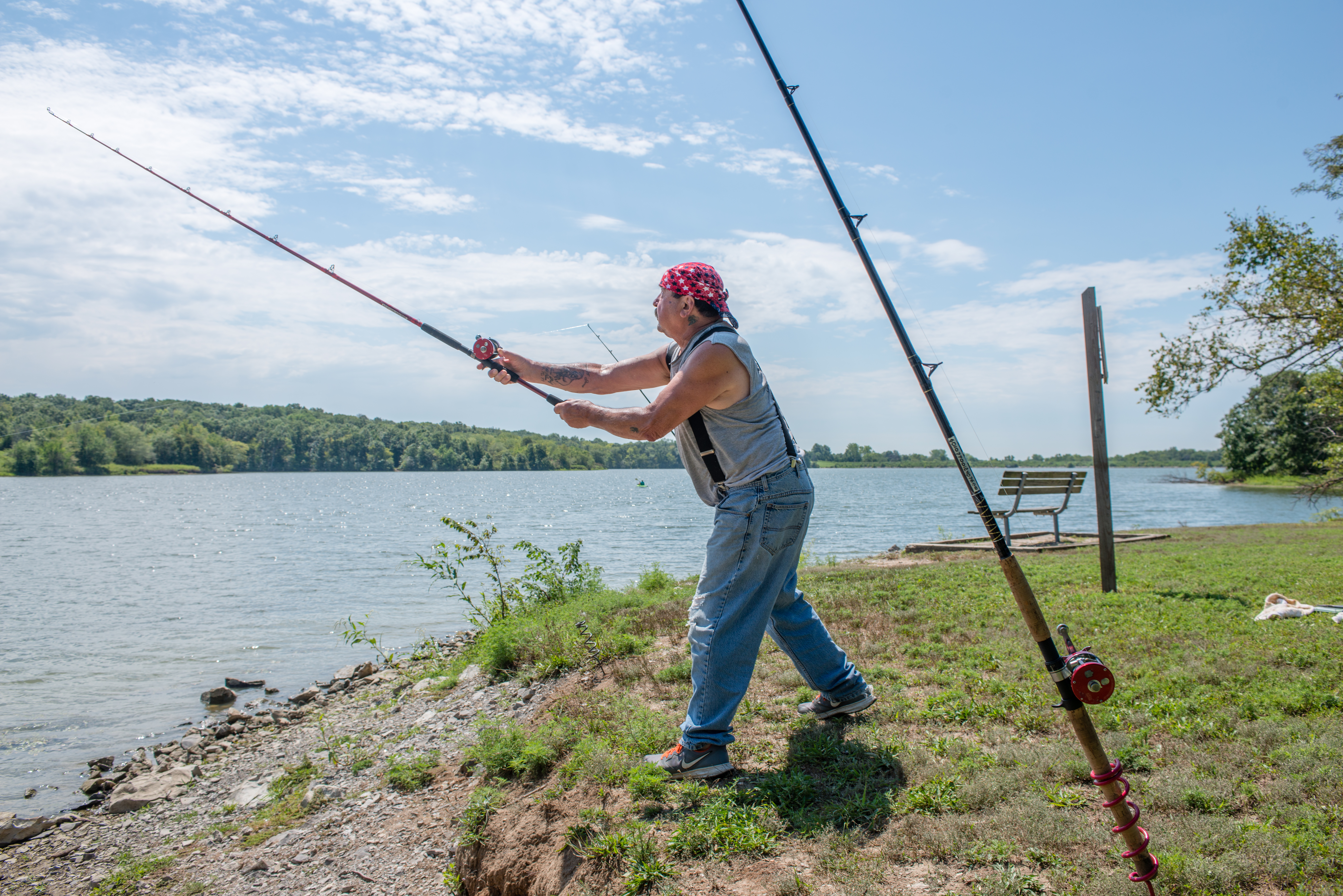 People fishing on a river