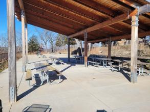 picnic shelter with several tables