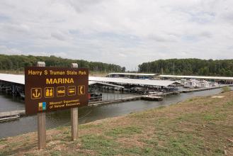 marina sign with the many boat slips in the background
