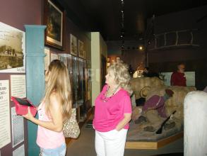 people looking at exhibits in the visitor center