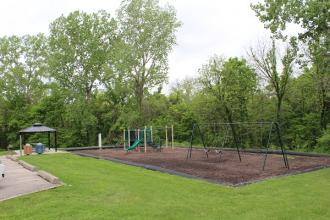 a swing set and slide