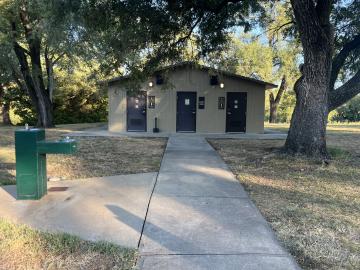 East Campground Showerhouse with sidewalk and water fountain in foreground