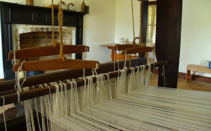 Close up image of an old loom