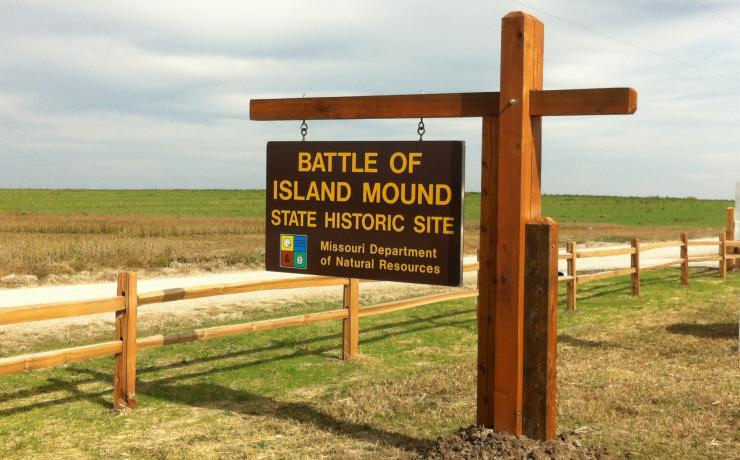 Welcome sign for the Battle of Island Mound State Historic Site
