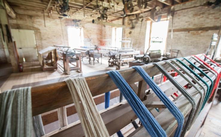 Dyed wool drying on a rack