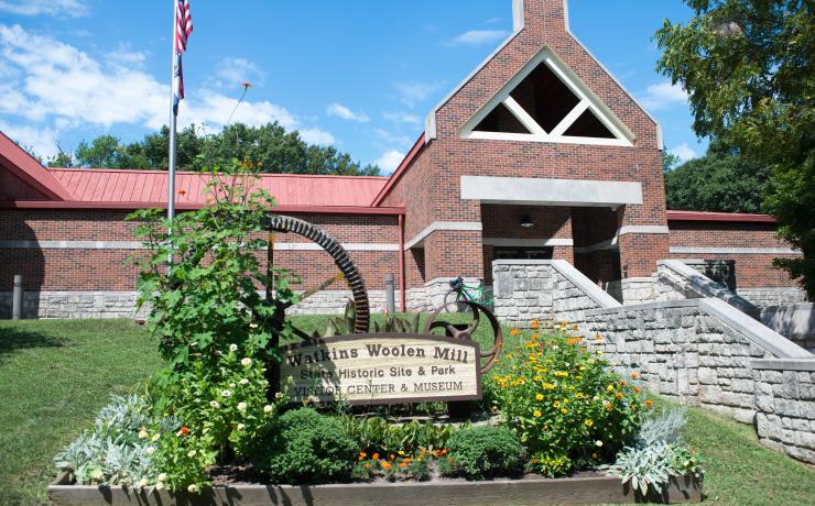 Watkins Woolen Mill sign in front of the mill