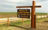 Welcome sign for the Battle of Island Mound State Historic Site