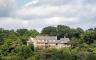 Drone image of the Bothwell Historical Site surrounded by trees