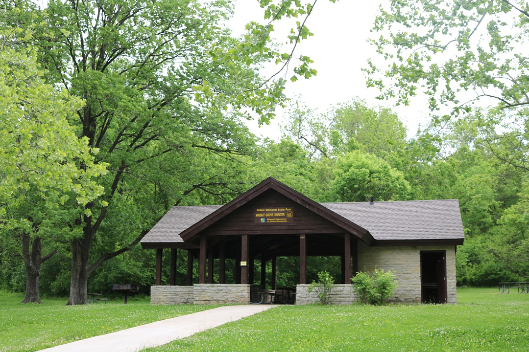 rock and wood picnic shelter