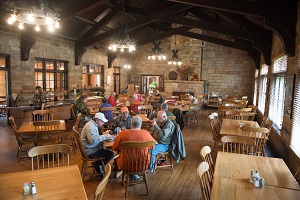 guests eating inside the dining lodge