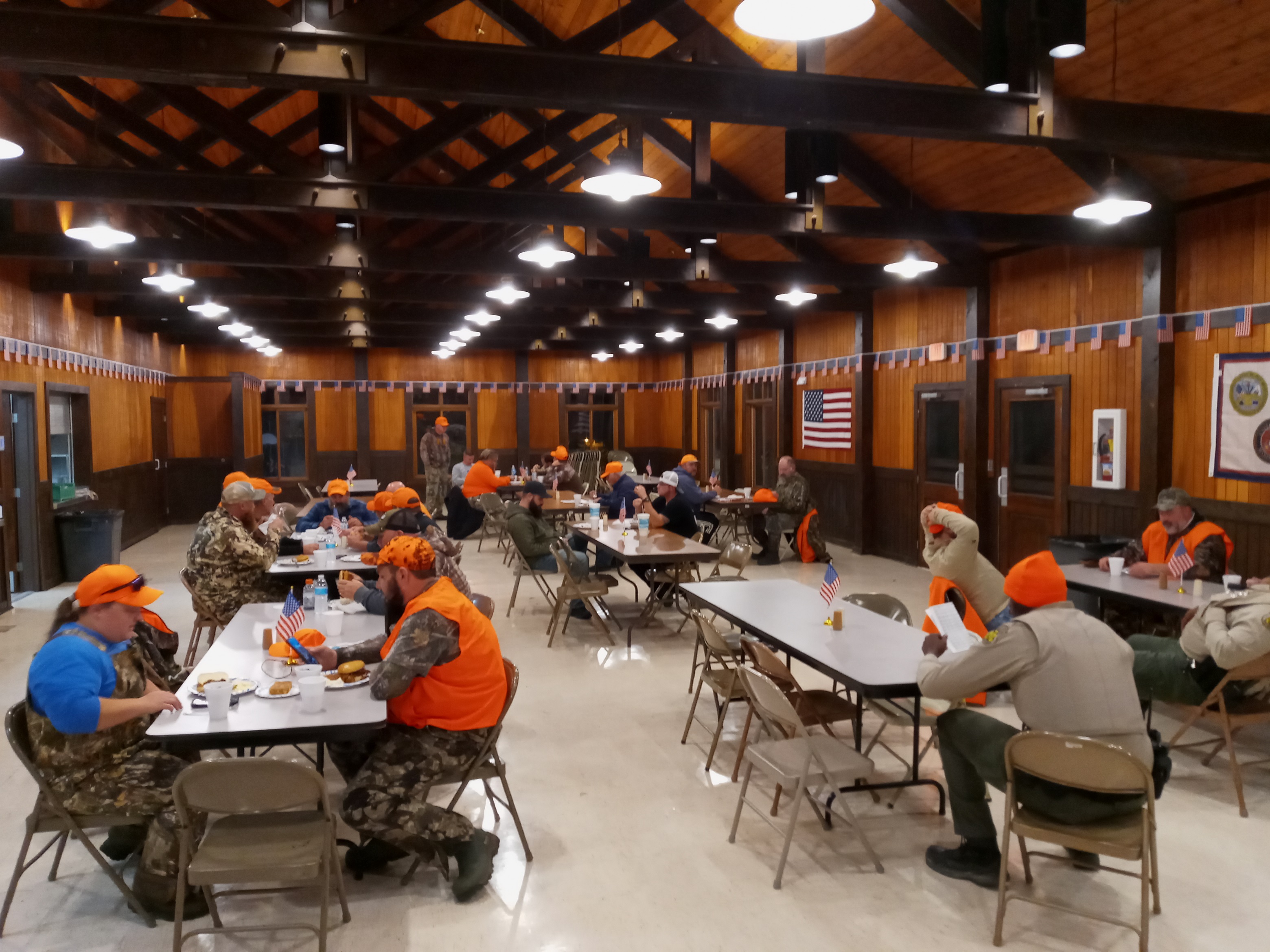 Veterans, staff and volunteers share a meal inside during the 2021 hunt.