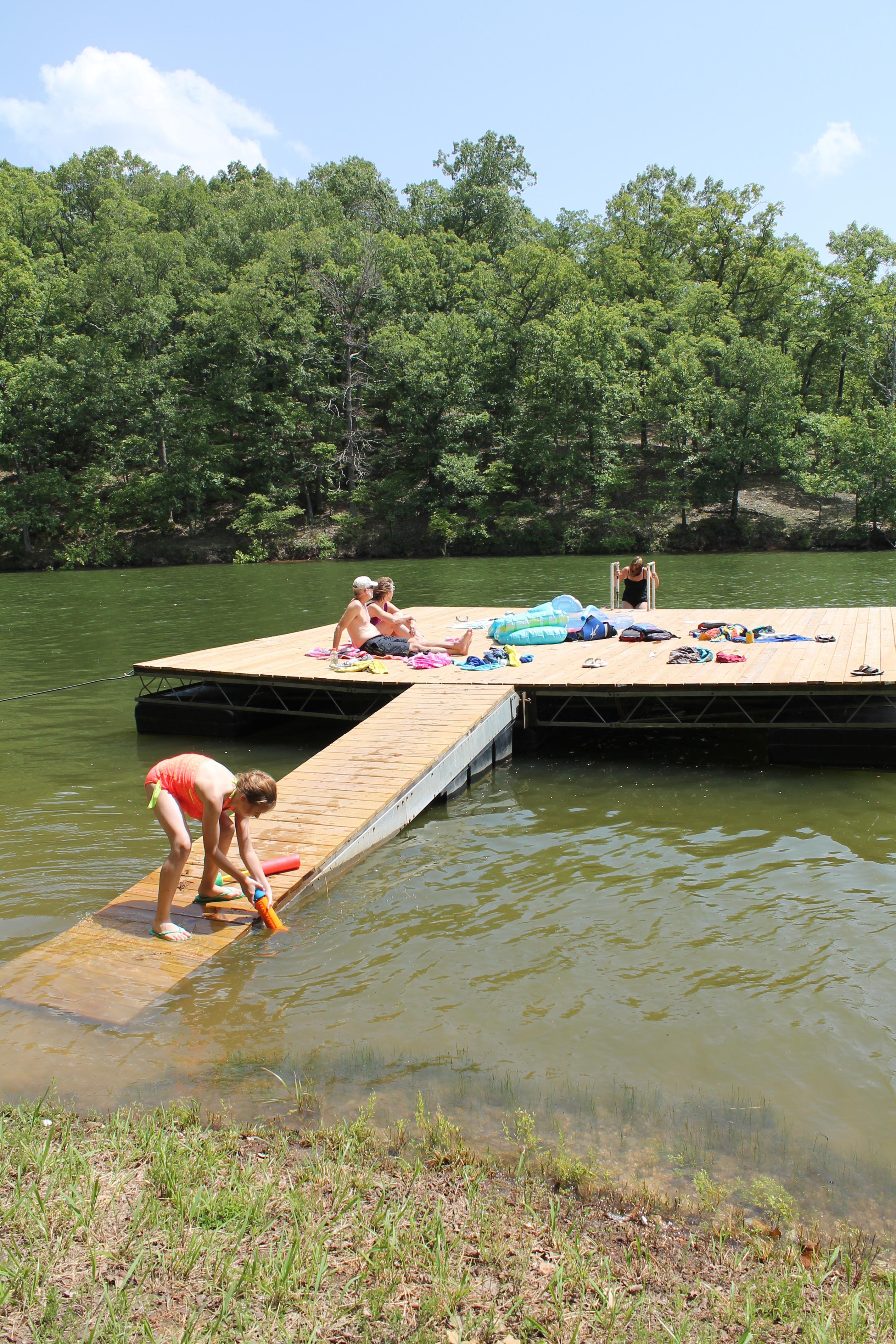 kids on the swimming dock