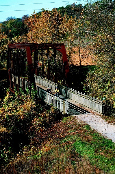 fall color view of one of the railroad bridges along the trail