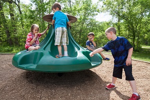 children playing on playground equipment