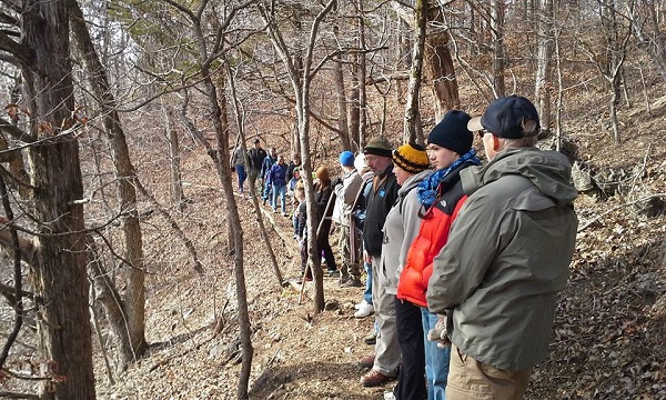 people on a guided hike during the winter