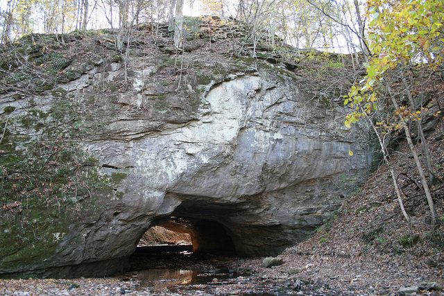 water flowing under the rock bridge