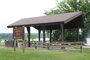 picnic shelter with lake in the background