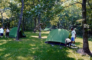 Boy Scouts setting up tents