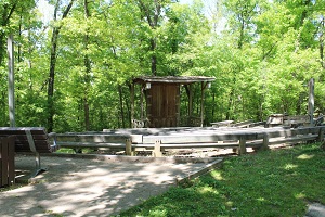 wooden benches and the stage at the amphitheater