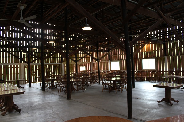 tables inside the enclosed shelter