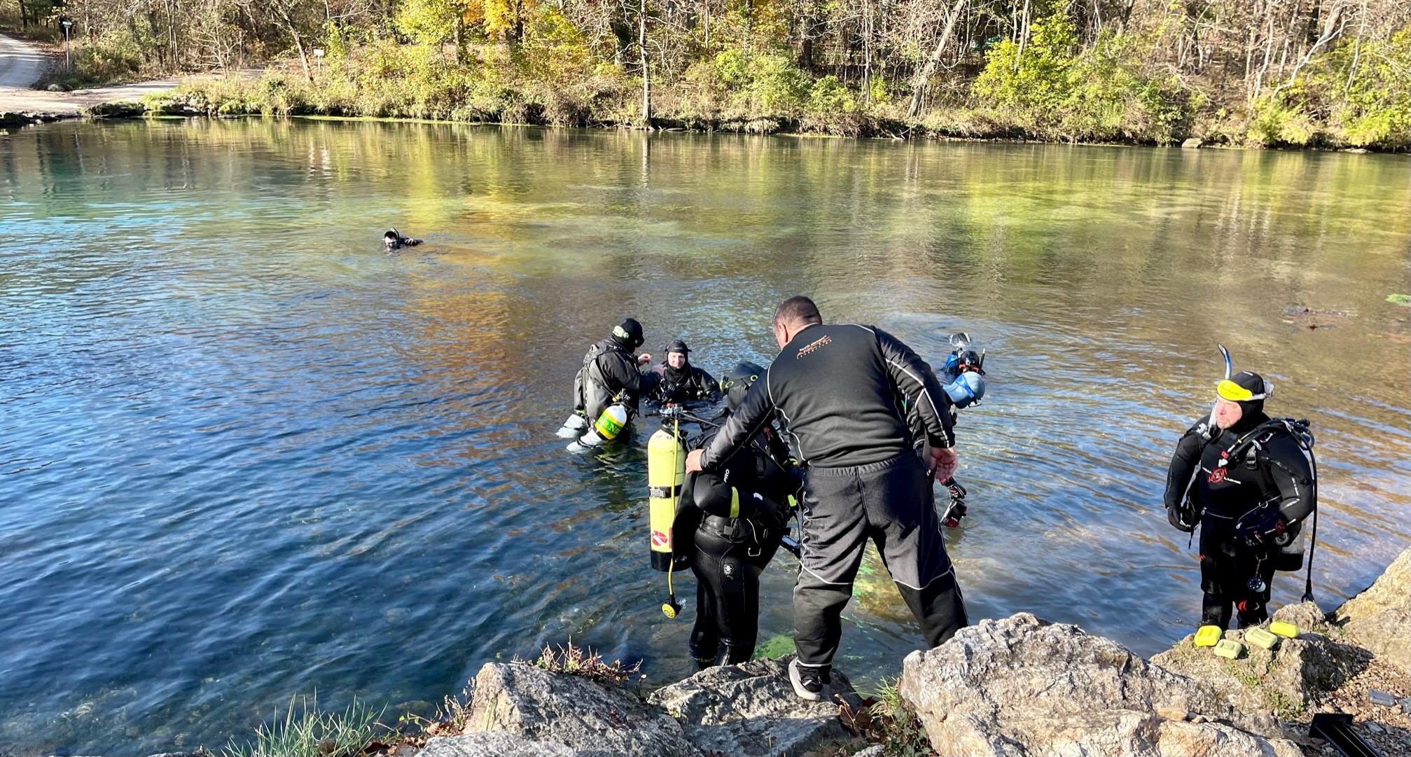 Divers entering the water
