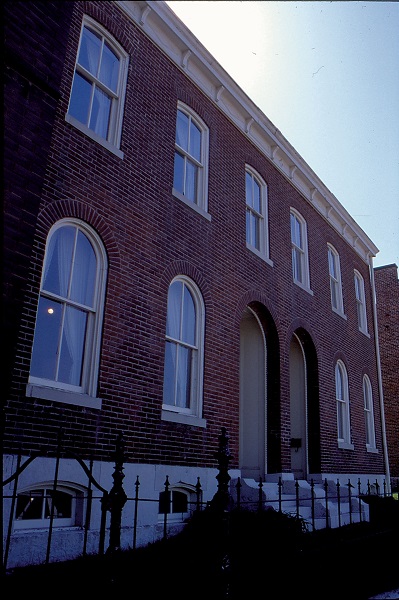 exterior of the two-story, red brick Joplin house